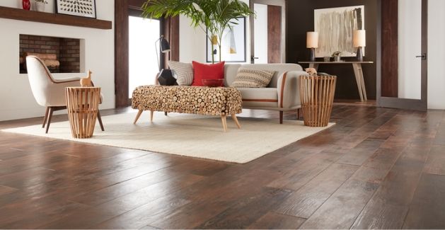Hickory Hardwood in living room by Carpet One Floor & Home